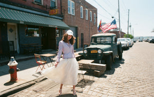 Girl wearing true vintage dress and second hand blazer in Brooklyn New York