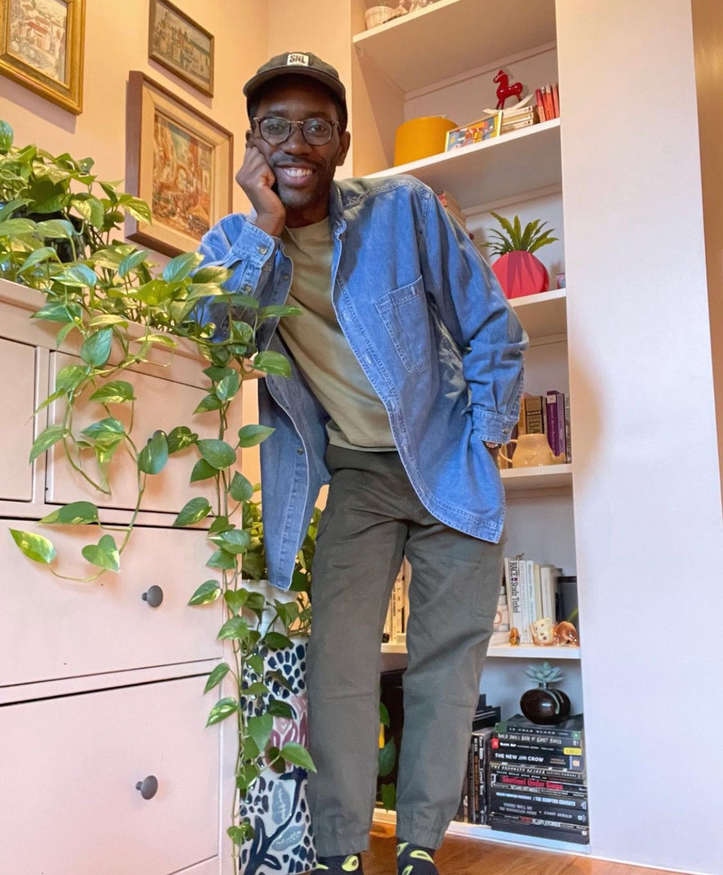 Thrifted and styled OOTD men’s denim shirt in Brooklyn aesthetic apartment tagged on Instagram by @adrianjhopkins
